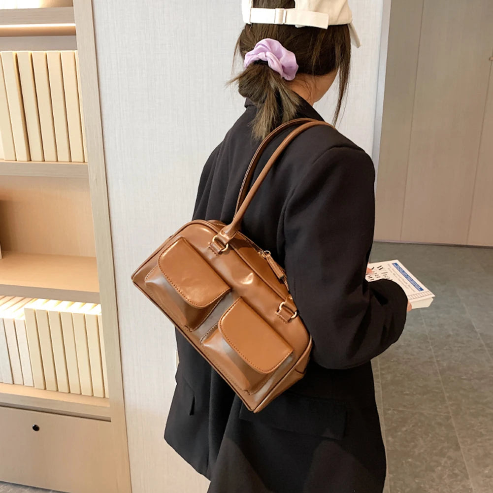 Multi pocket shoulder bag